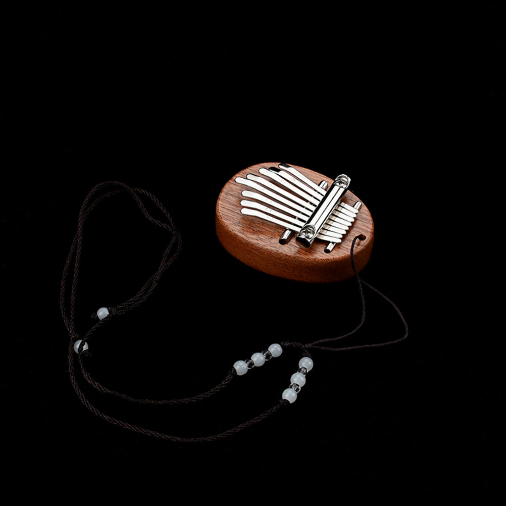 Kalimba de 8 Teclas com Cordão - Musical Instrument Family avaliação e preço